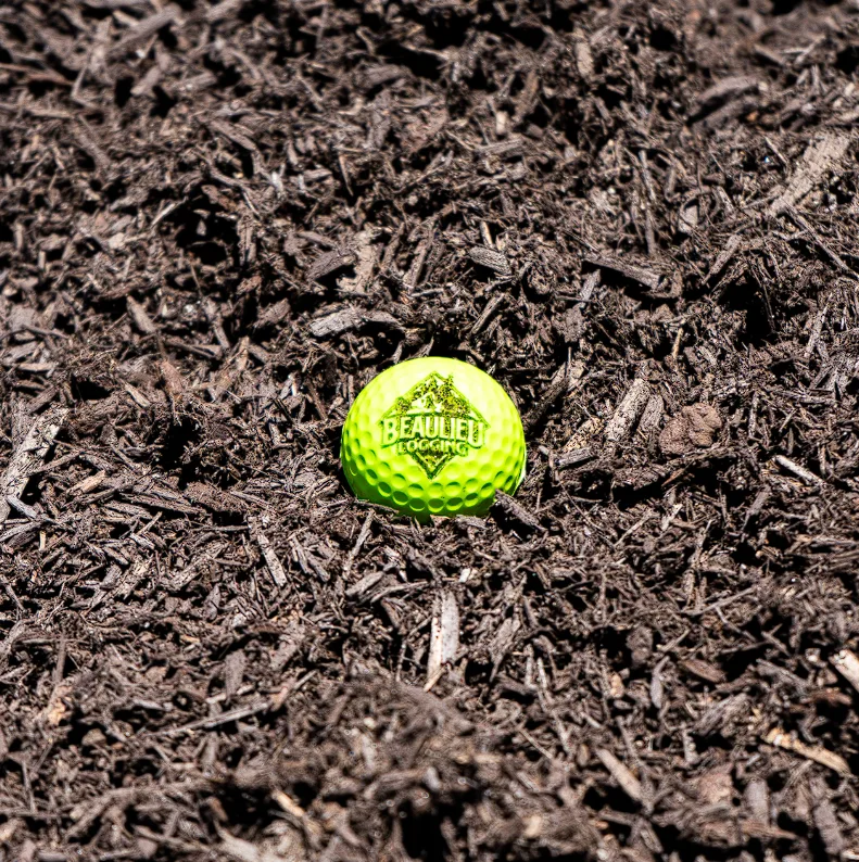 Brown mulch at Beaulieu Logging yard, Lyman Maine